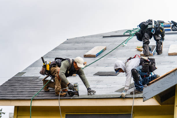 Professional Roofing technician working in Kansas, OH